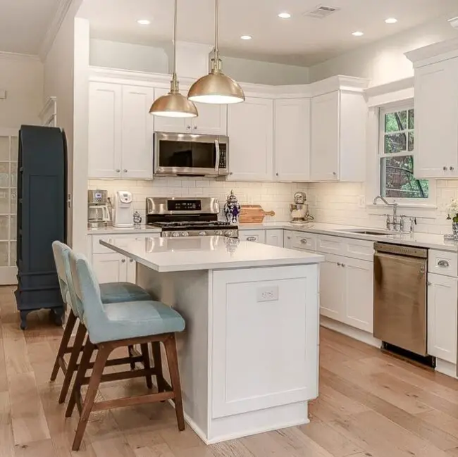 Light and Soft Blue Accents in Farmhouse Kitchen