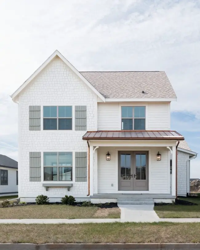 White Siding with Elegant Copper Accents