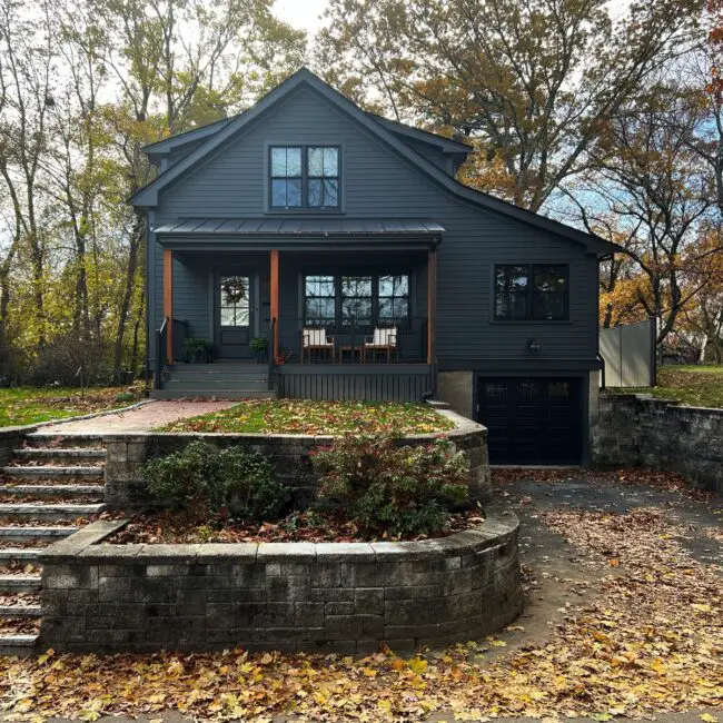 Cozy Dark Gray with Natural Wood Siding