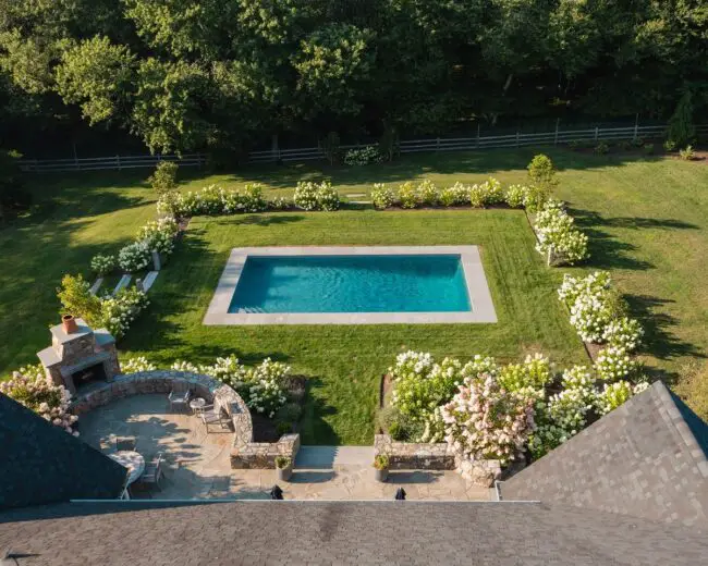 Garden Oasis Surrounding Inviting Pool