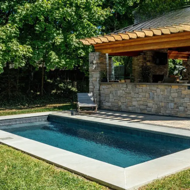 Inviting Poolside Pergola with Rustic Appeal