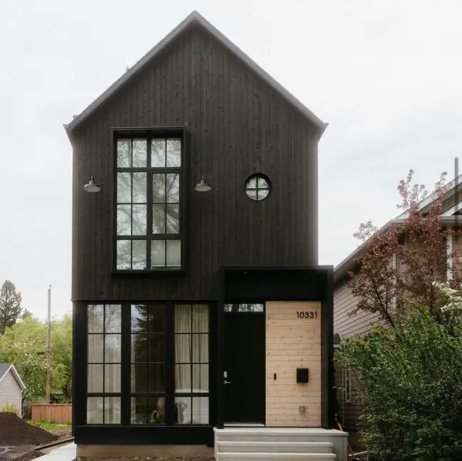 Impactful Sleek Black Wood Siding