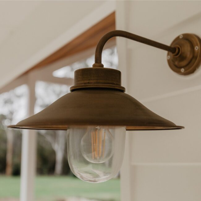 Brass-Arm Sconce for Timeless Lighting