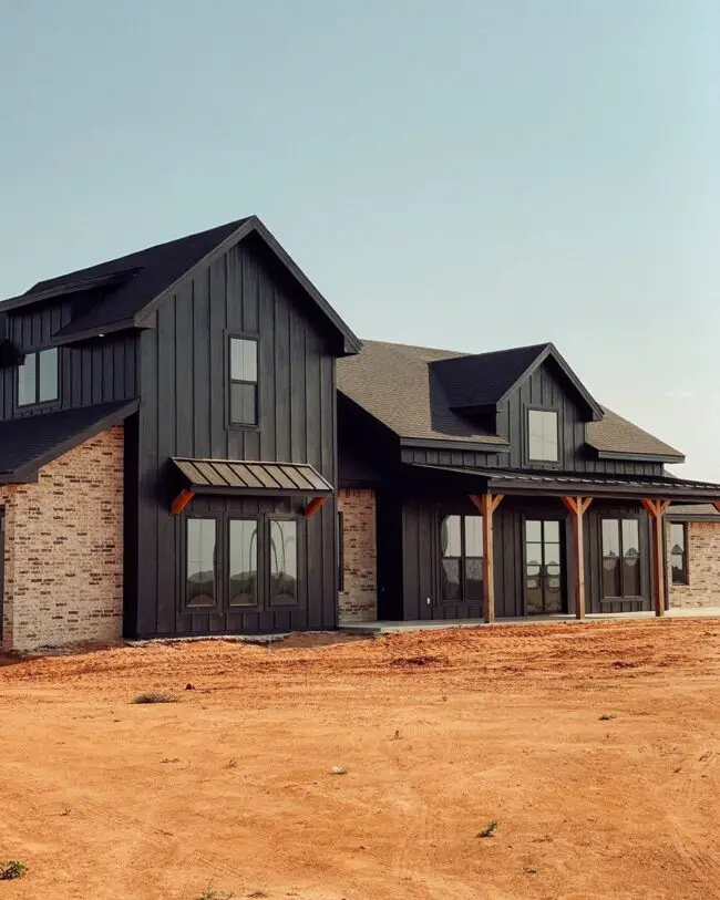 Black and Cedar Farmhouse with Brick