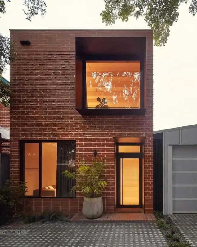 Contemporary Brick Box House with Expansive Windows