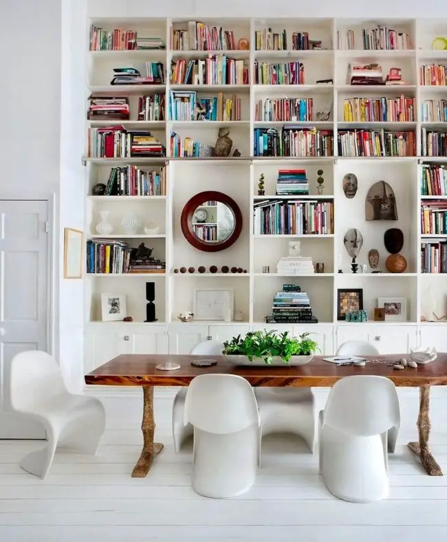 Chic Dining Room Library with Artistic Touches