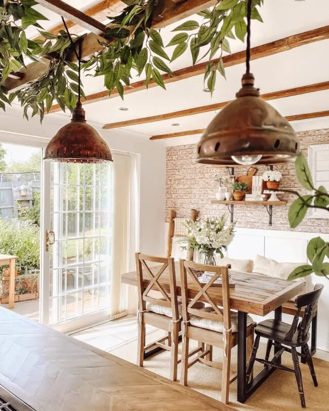 Copper Accents and Exposed Beams in Rustic Dining