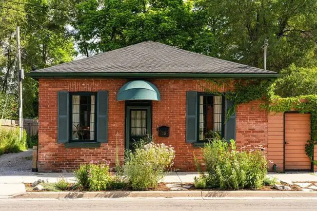 Cozy Brick Cottage with Green Touches