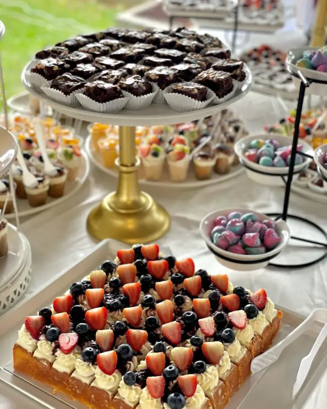 Decadent Dessert Table with Brownies and Fruits