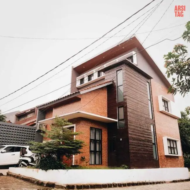 Modern Brick House with Contrasting Materials