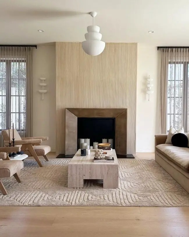 Neutral Tones and Textured Fireplace for Elegance